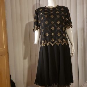 A black and gold silk evening dress